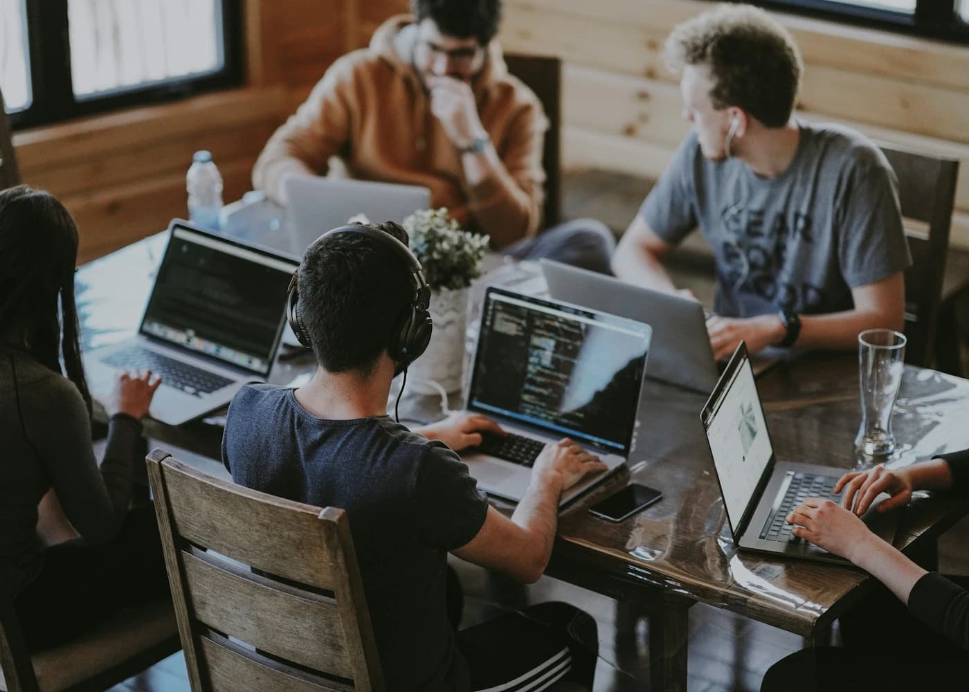 Diverse technology team collaborating in a modern office